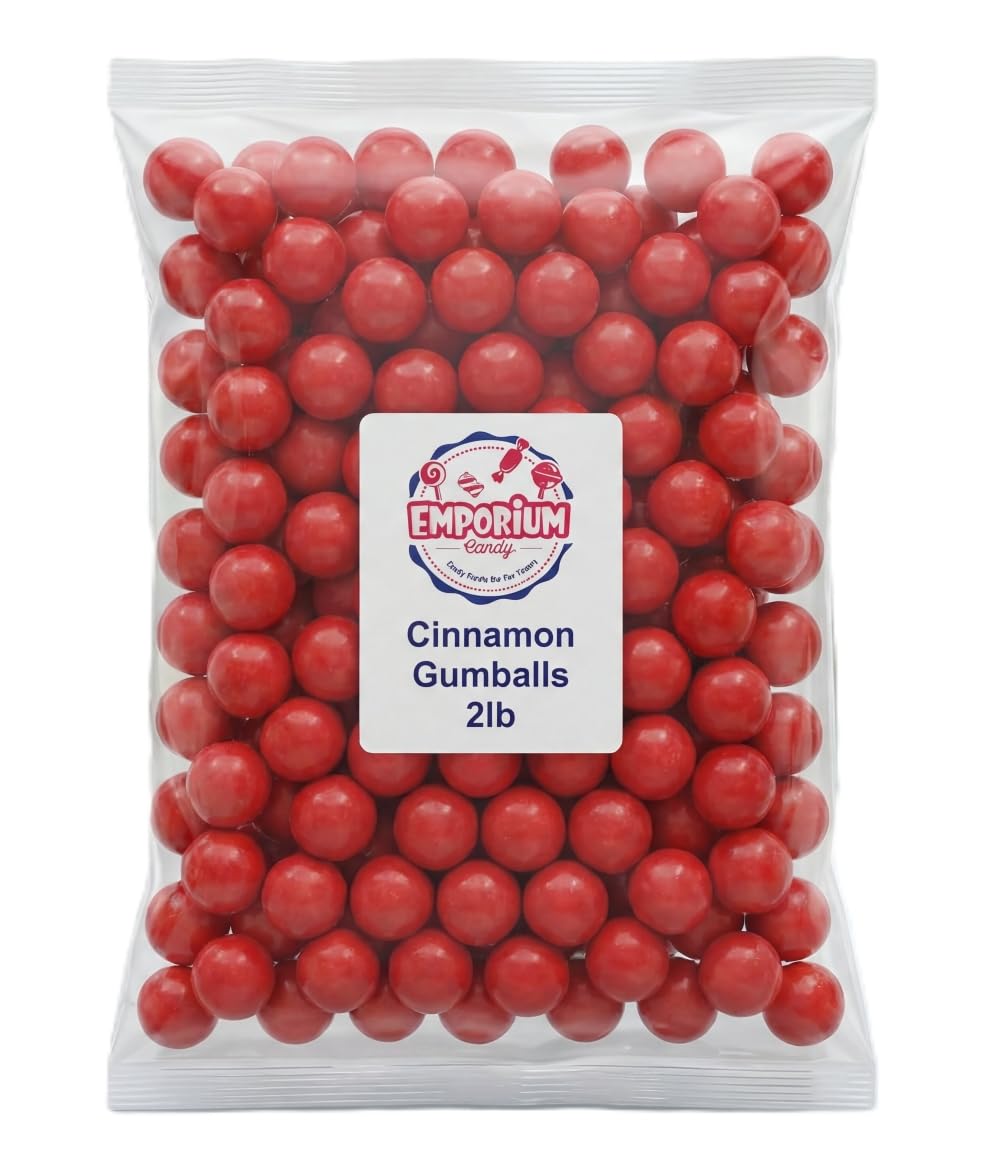 EMPORIUM CANDY close-up texture of glossy red cinnamon gumball highlighting crunchy shell and flavor