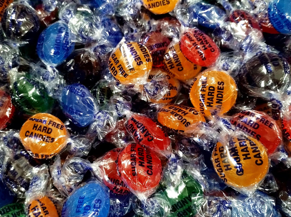 EMPORIUM CANDY TASTY TREATS size comparison with coin shows pocket-friendly portions