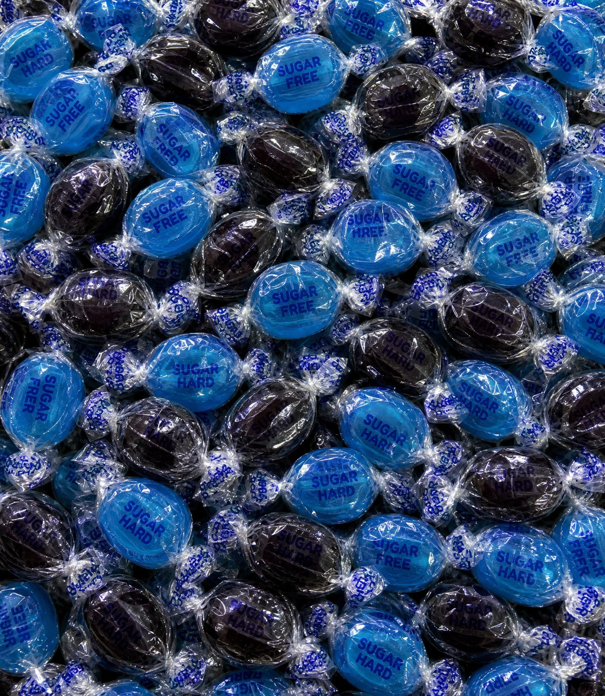 EMPORIUM front bag showing mixed blackberry and raspberry candies for easy sharing