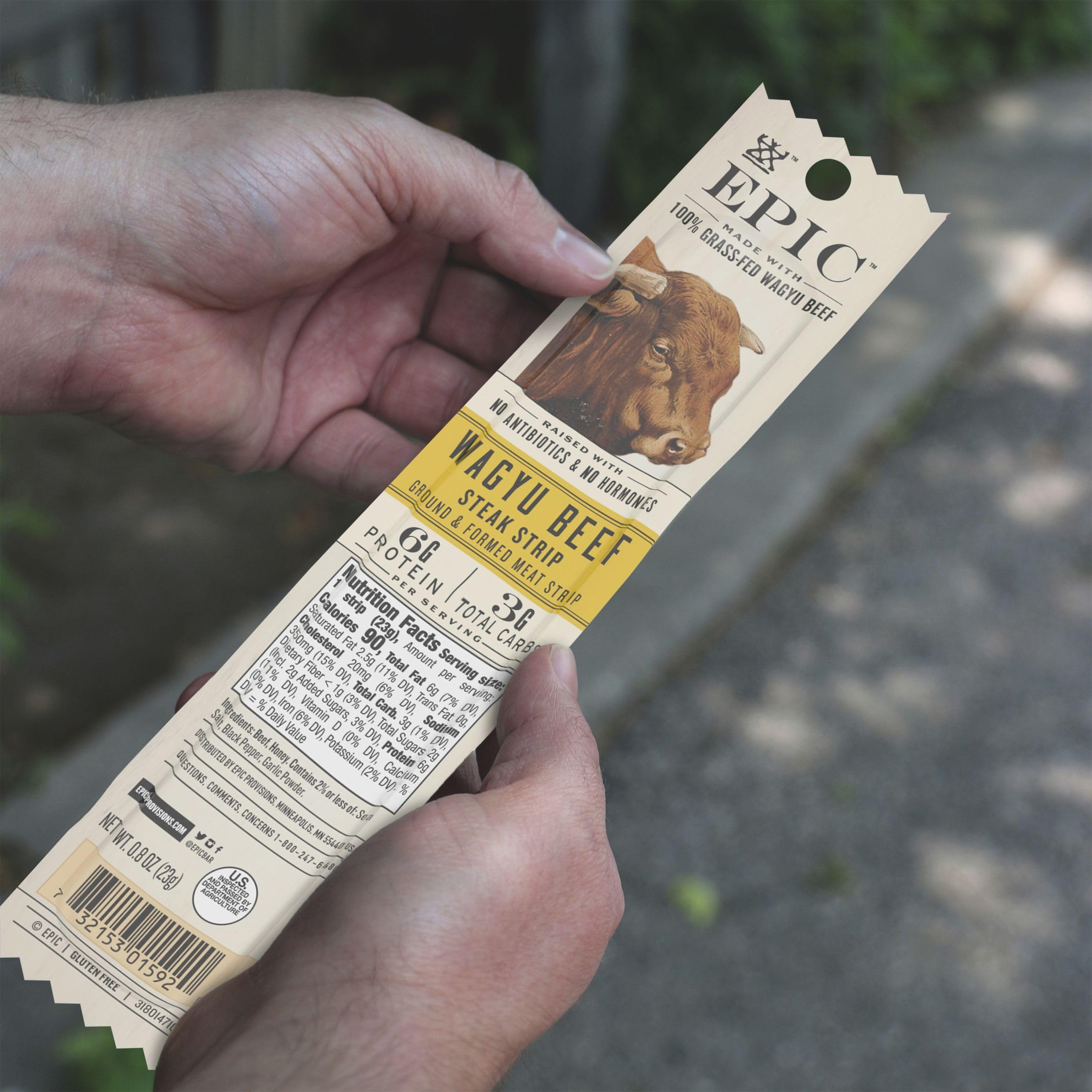 Epic wagyu strip held in hand to display size and grab-and-go use