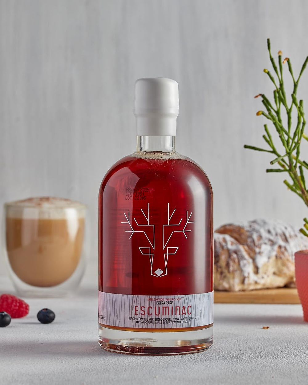 Escuminac drizzled over pancakes illustrating balanced sweetness for breakfast