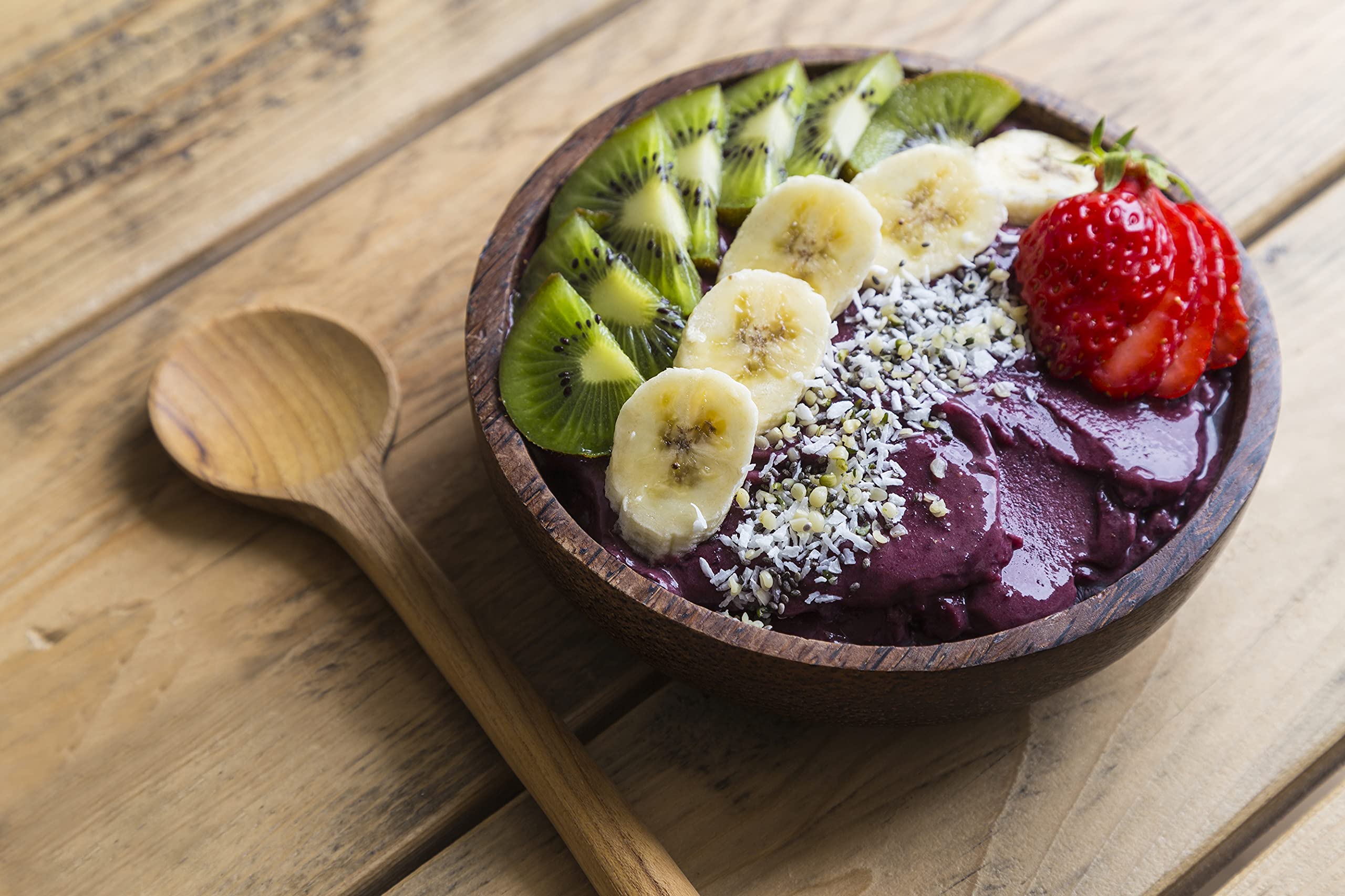 Especial Fruits açaí bowl in use topped with granola showing quick healthy breakfast