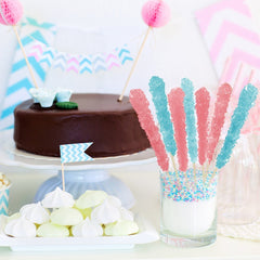 Espeez candy sticks arranged in a glass jar as a colorful centerpiece