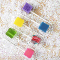 Espeez cube lollipops in a colorful bowl at a party showcasing easy serving and decor