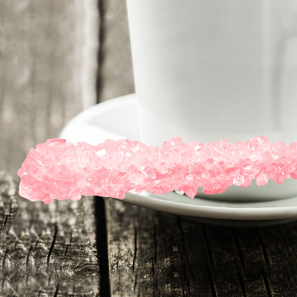 Espeez wedding candy buffet arrangement with pink sticks creating elegant party favor visuals benefit