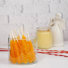 EUPHERBIA stick dissolving in hot teacup, releasing saffron scent and color