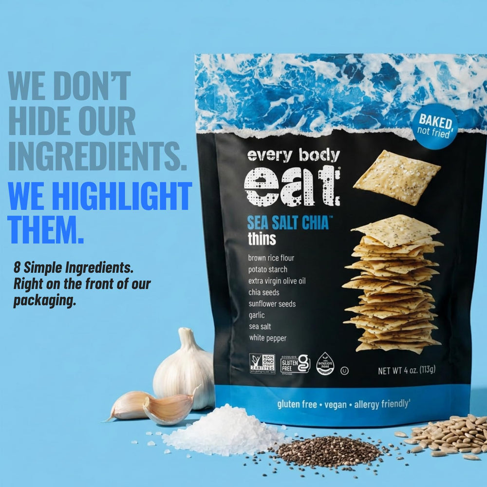 Every Body Eat crackers dipped into hummus showing versatile pairing benefit