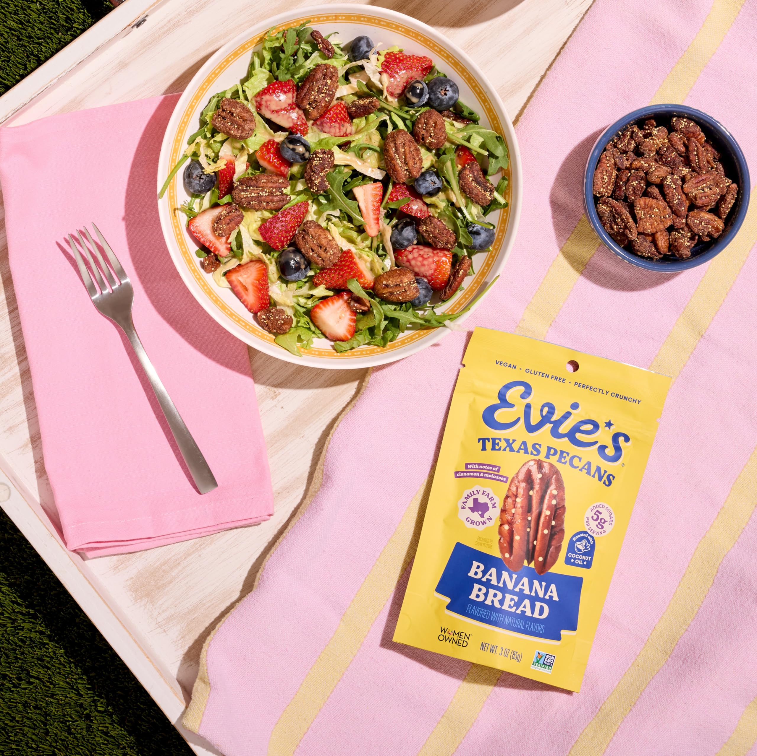 Size comparison of Evie's 3 oz pouch showing snackable single-serve benefit