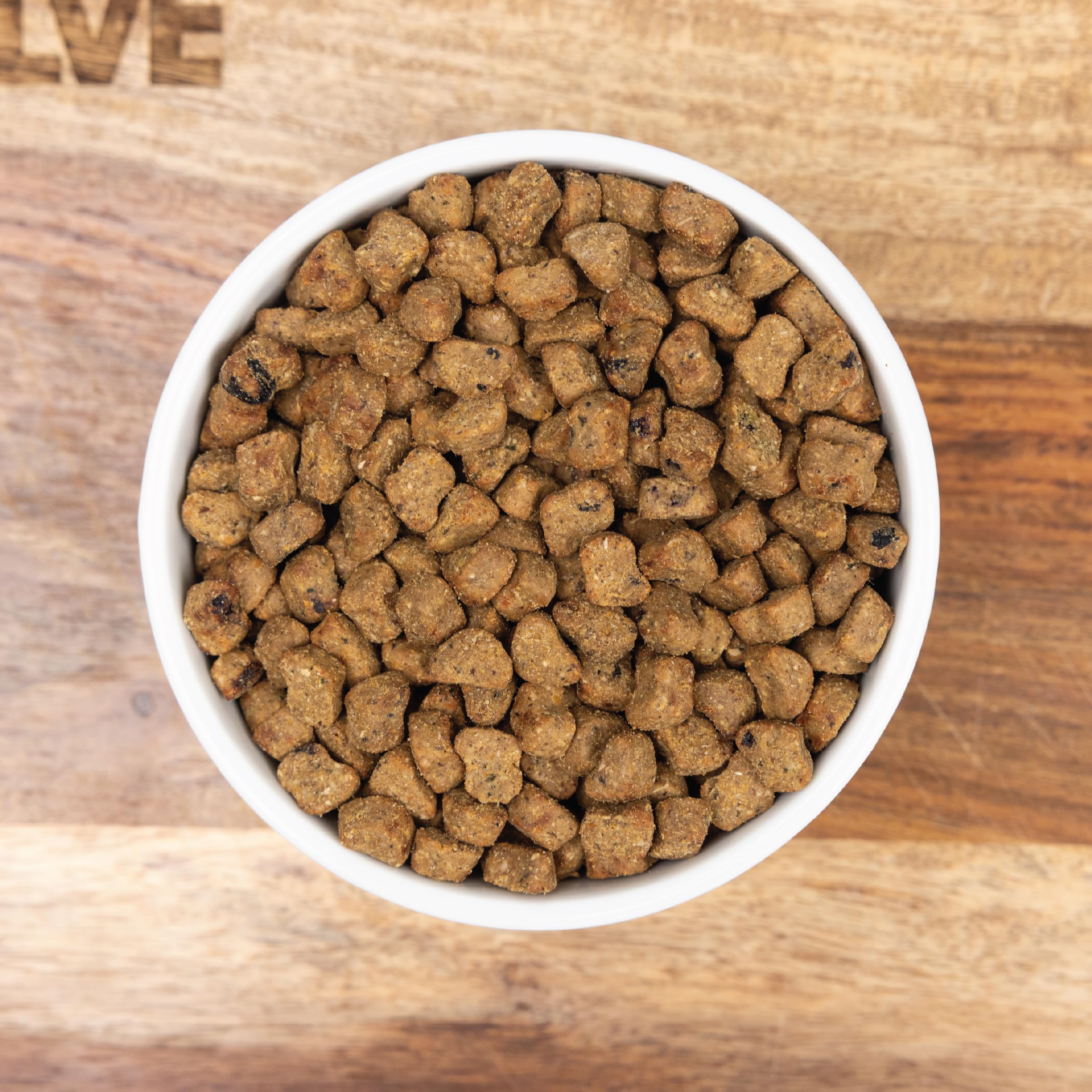 Evolve product label close-up showing ingredient list and feeding guidance