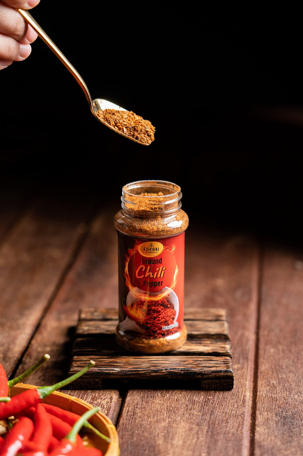 EZ THAI open jar with spoon suggesting easy seasoning benefit