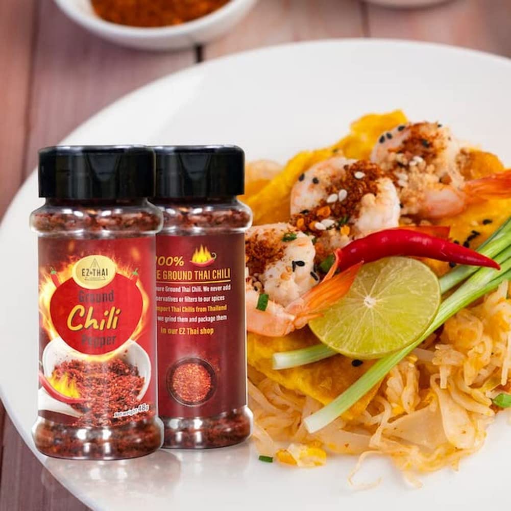 EZ THAI being sprinkled on pizza to boost smoky spicy flavor