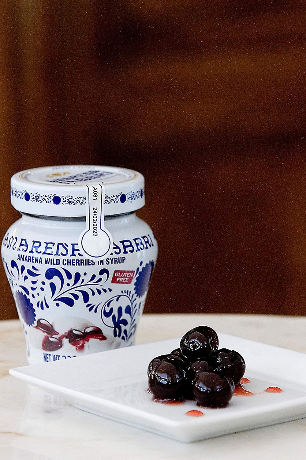 Fabbri cherry topping on gelato adding color and gourmet finishing touch
