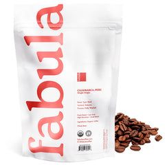 Fabula whole beans close-up texture, shows roast color and quality