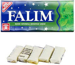 Falim gum in hand to show compact size and easy portability