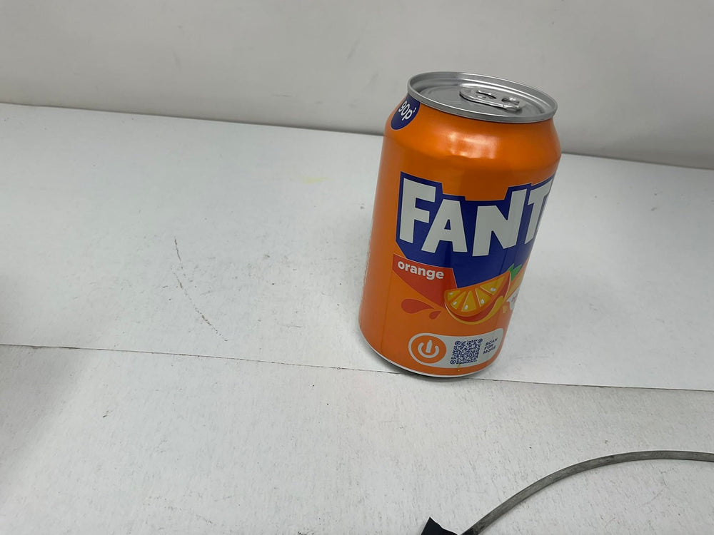 top view of Fanta can pull tab ready to open showcasing convenience and portability