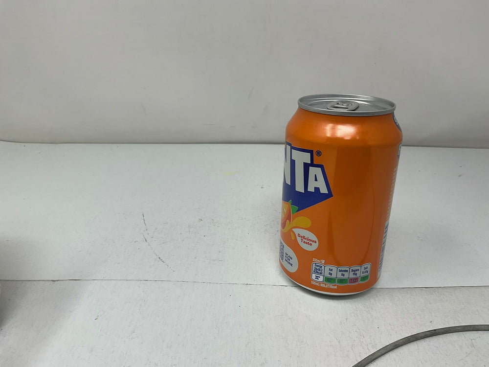 Fanta can ingredient label close-up helping shoppers check contents