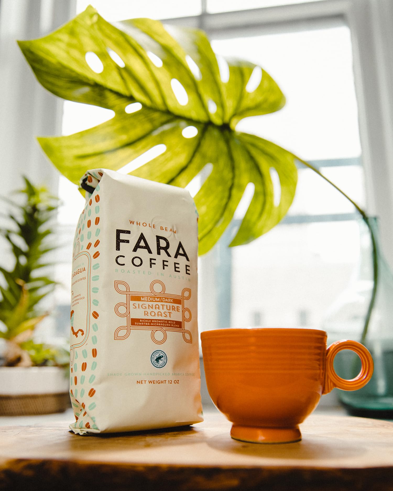 Fara Coffee bag beside scale illustrating 2.2 lb size for value