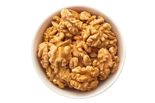 Farm Fresh Nuts walnut held in hand showing size and portion control benefit