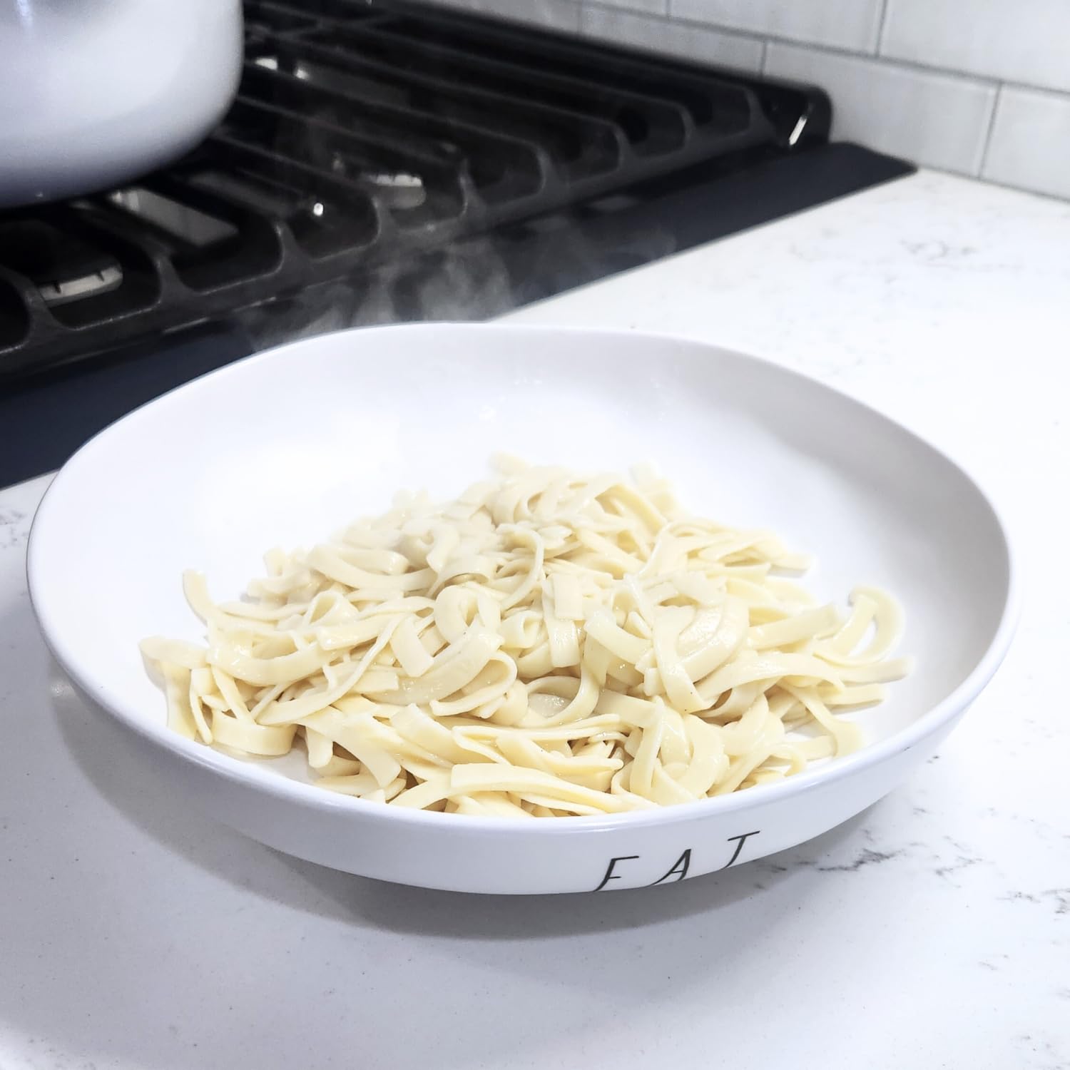 Open bag of Farmhouse Preserve noodles on wood showing ready-to-cook convenience