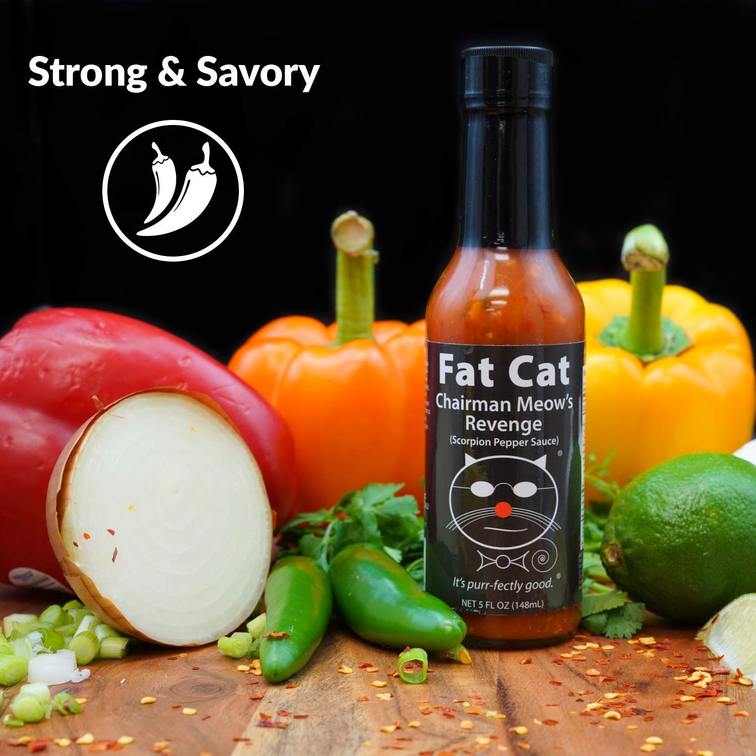 Fat Cat spoon of sauce showing texture and color, helps judge heat and consistency