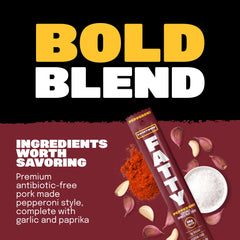 FATTY meat stick held in hand to show size and convenient protein-per-stick benefit
