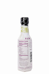 Fee Brothers plum bitters close-up of deep amber liquid highlighting rich plum color and texture