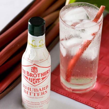 Fee Brothers rhubarb bitters in a cocktail shaker being added for bright, balanced flavor