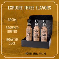 Fee Brothers roasted duck bottle pouring into a mixing glass to add savory depth