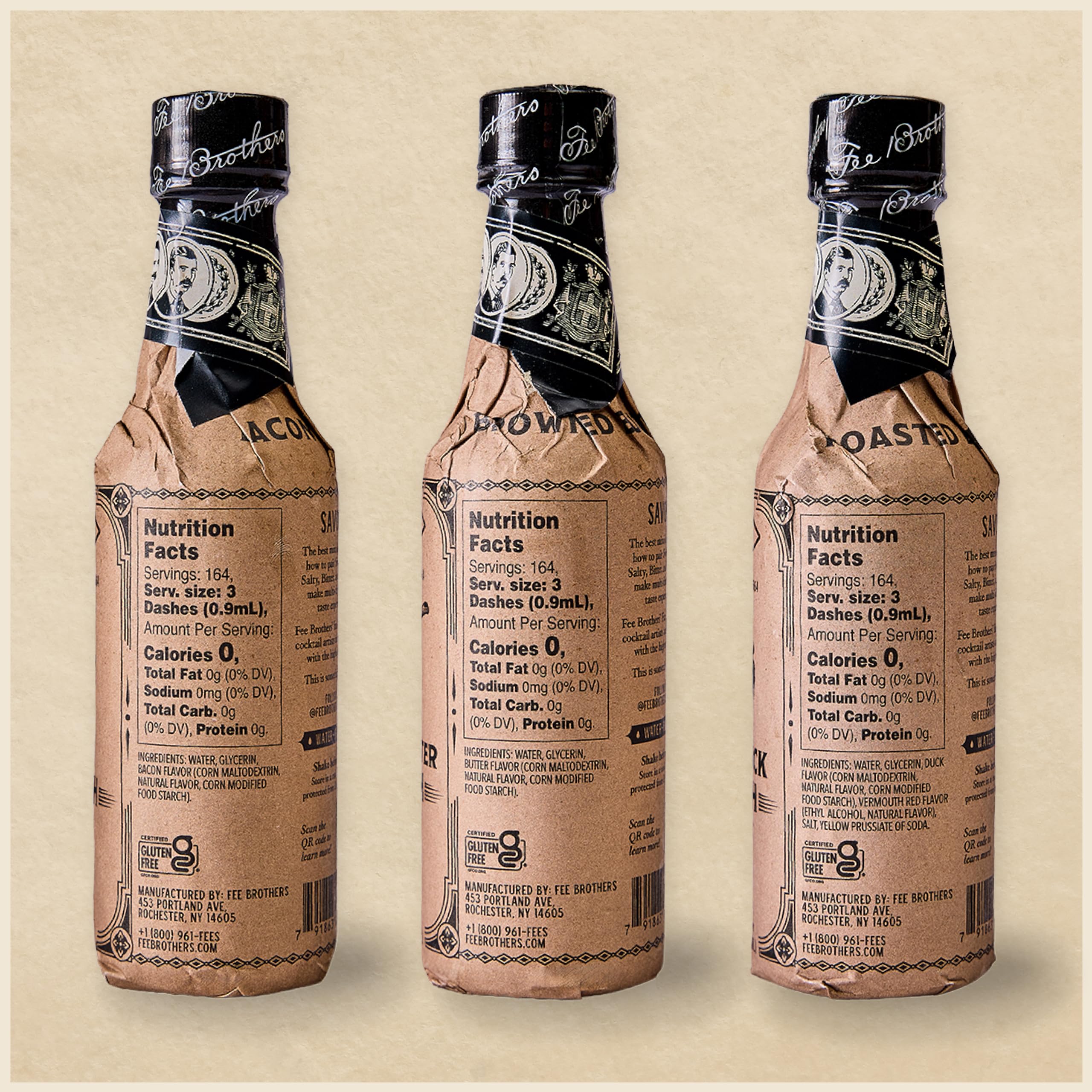 Fee Brothers three fat wash bottles staged on a back bar for quick bartender use