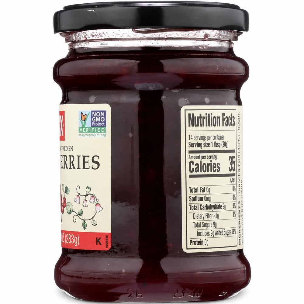 Open jar close-up of Felix lingonberries texture highlighting whole berries and preserve sheen