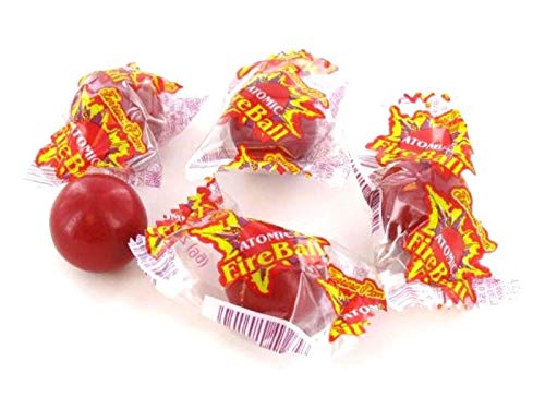 Ferrara ATOMIC FireBall close-up of jawbreaker texture, highlights slow-melting intense flavor