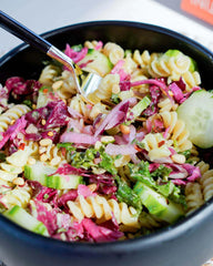 Fiber Gourmet cooked rotini in bowl showing sauce cling and serving
