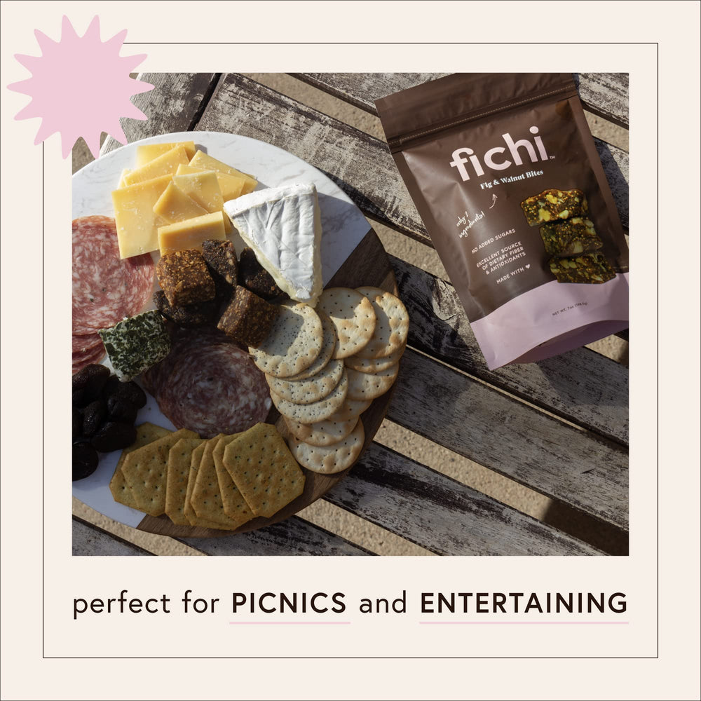 Fichi on cheese board with meats and cheeses offering elegant entertaining option