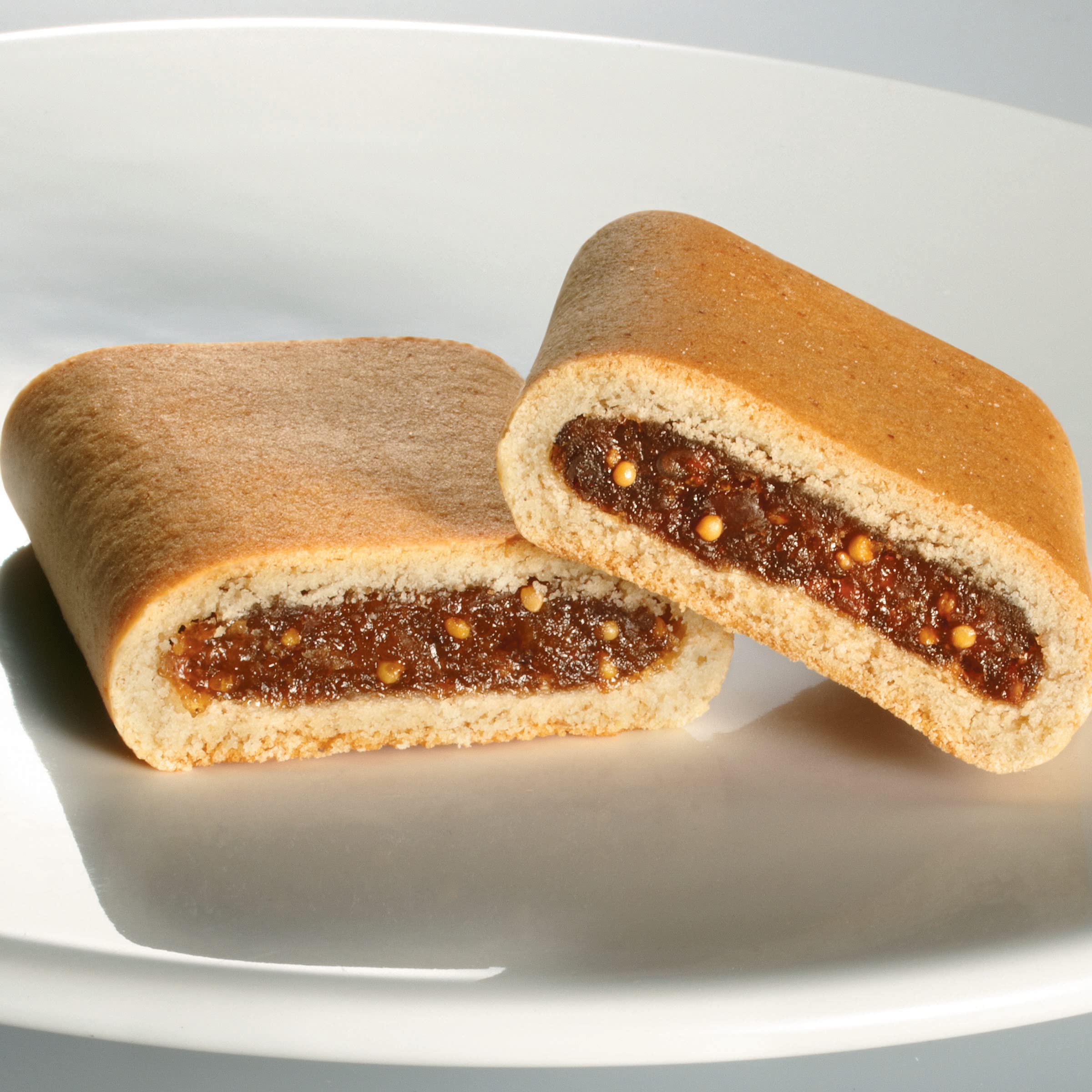 Fig Newtons held in hand on a sidewalk showing travel snack benefit