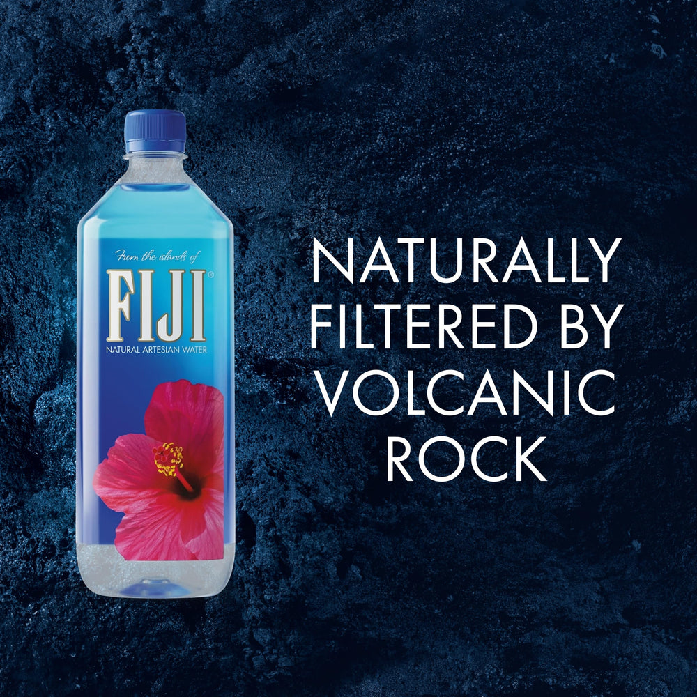 FIJI bottle held in hand to display scale and travel-friendly capacity benefit