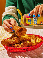Pouring texture close-up of Fila Manila banana ketchup showing smooth consistency