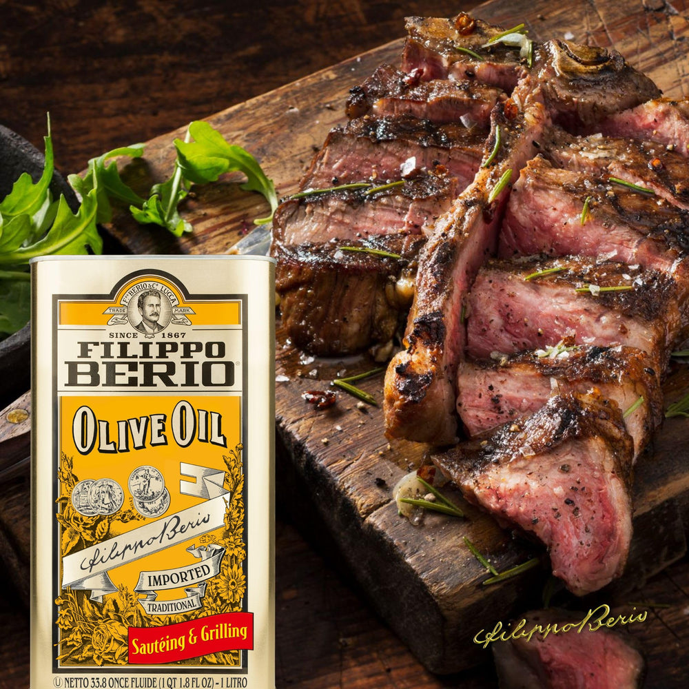 Filippo Berio tin next to measuring cup for scale, showing the 33.8-ounce size advantage