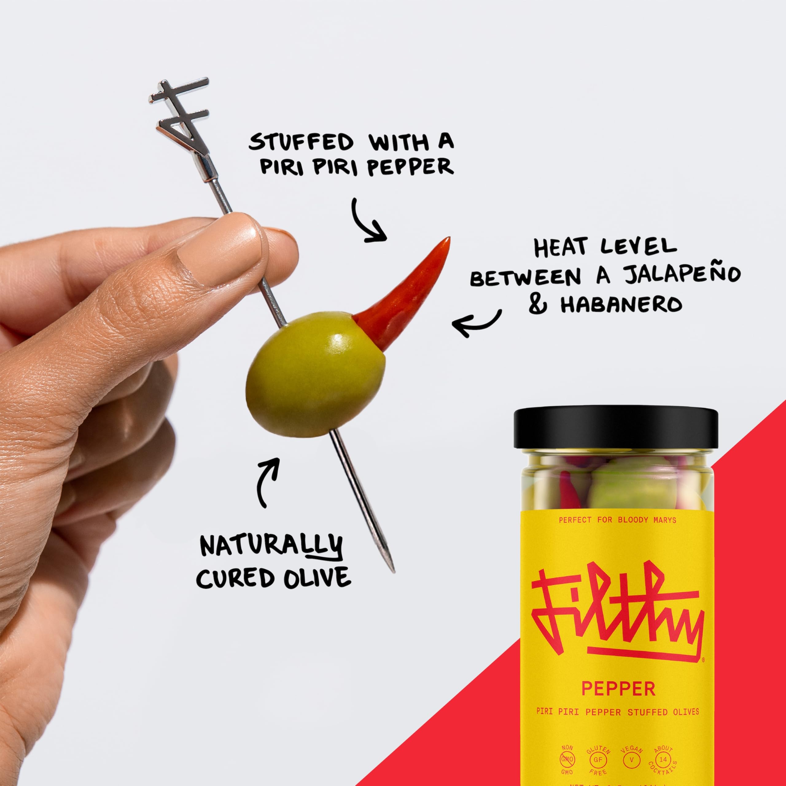 open Filthy jar with brine visible, preserving olives for fresh cocktail garnishes
