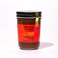 Fine & Raw close-up of creamy hazelnut butter texture showing rich cacao taste