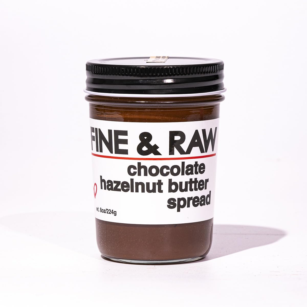 Fine & Raw front jar view showing organic label and premium design for shelf appeal