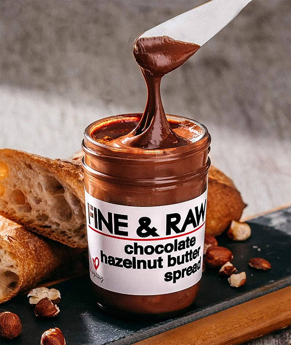 Fine & Raw jar next to common items to show 8 ounce scale for portion clarity