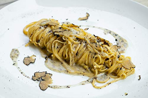 Fine Food Dittmann close-up of thin shaved truffle slices showing texture and color