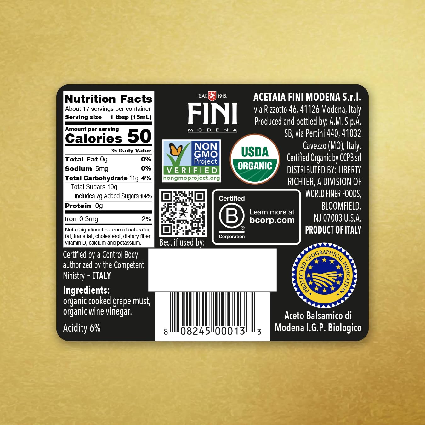 Fini bottle in kitchen lifestyle scene, implies everyday culinary versatility