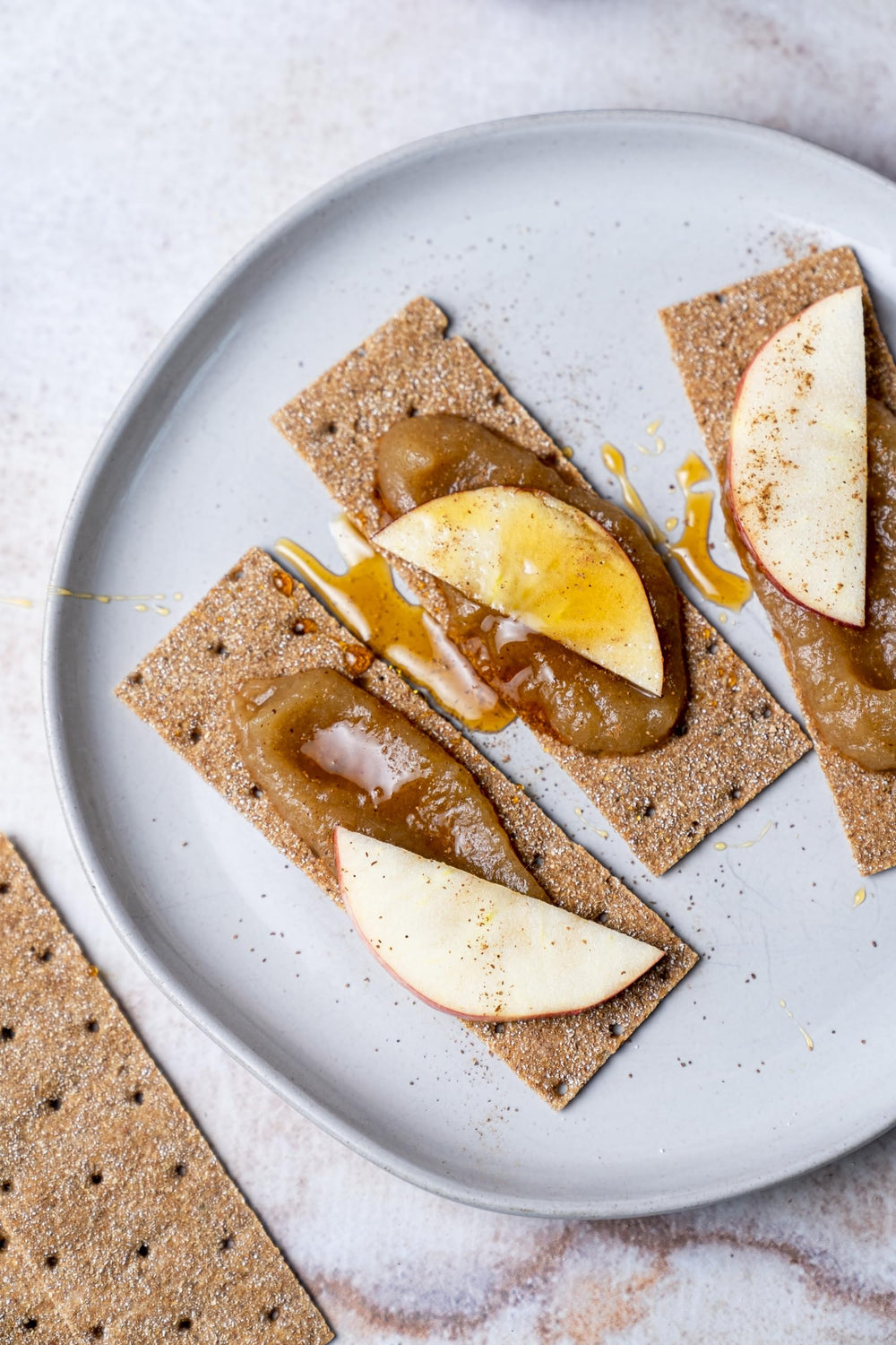 Finn Crisp on breakfast table with fruit and spreads demonstrating versatile use