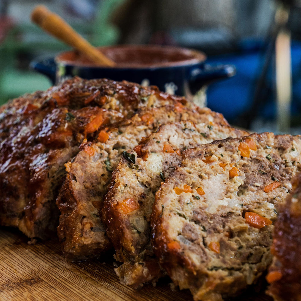 Fire & Smoke Society seasoned pulled pork next to bottle showing portion size