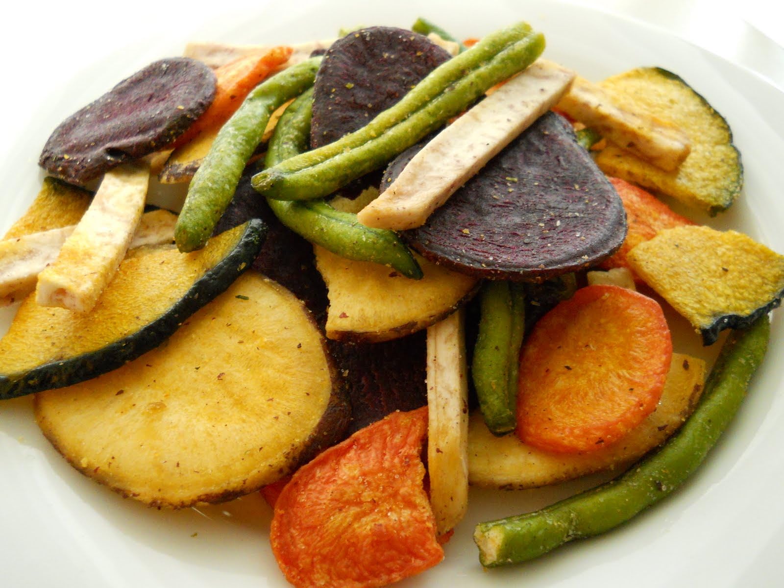 FirstChoiceCandy close-up texture in serving bowl highlighting crisp vegetable chips and colorful variety
