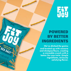 FitJoy pretzel stick dipping into hummus showing scoopable shape and utility