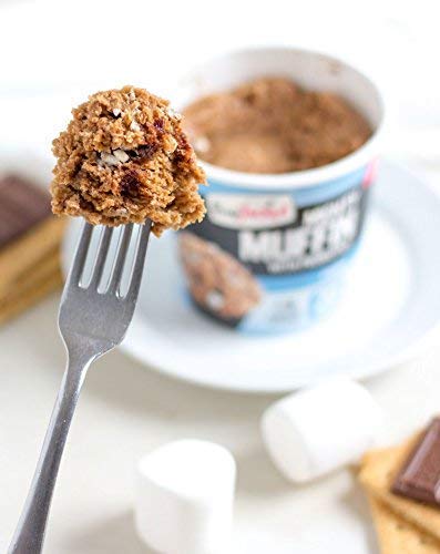 FlapJacked chocolate peanut butter muffin split open highlighting nutty filling