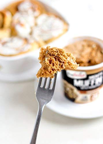 FlapJacked muffin on a plate next to a microwave indicating quick warmth benefit
