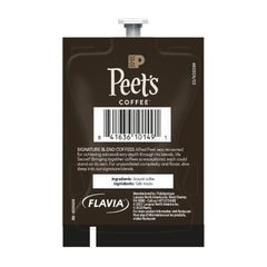 Flavia Peet's Colombia Luminosa brewed cup on table suggests bright, smooth taste